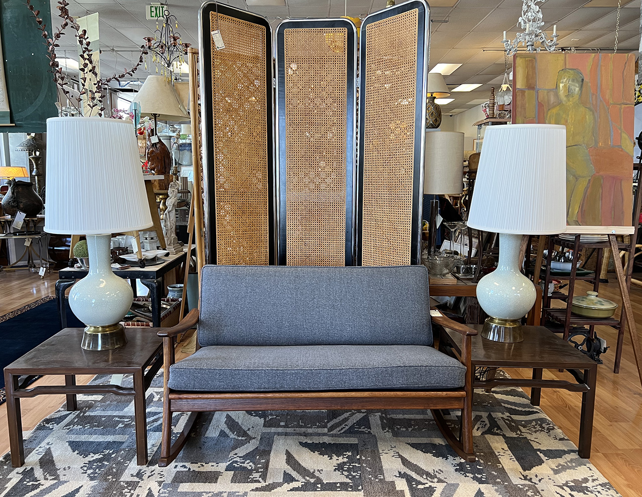 Showroom floor at Past Perfect with seating and tables on display